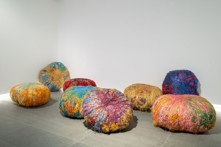 Sheila Hicks, Grand Boules, 2009. Liverpool Biennial 2025 at Tate Liverpool + RIBA North. Photo: Mark McNulty.