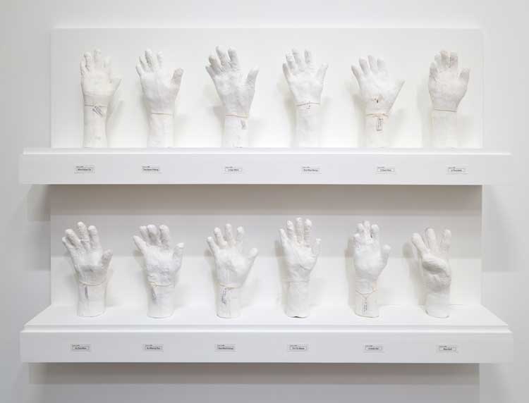 Htein Lin, A Show of Hands, 2013-ongoing. Plaster sculpture. Installation view, Htein Lin, Escape, Ikon Gallery, 2025. Image courtesy Ikon. Photo: David Rowan.
