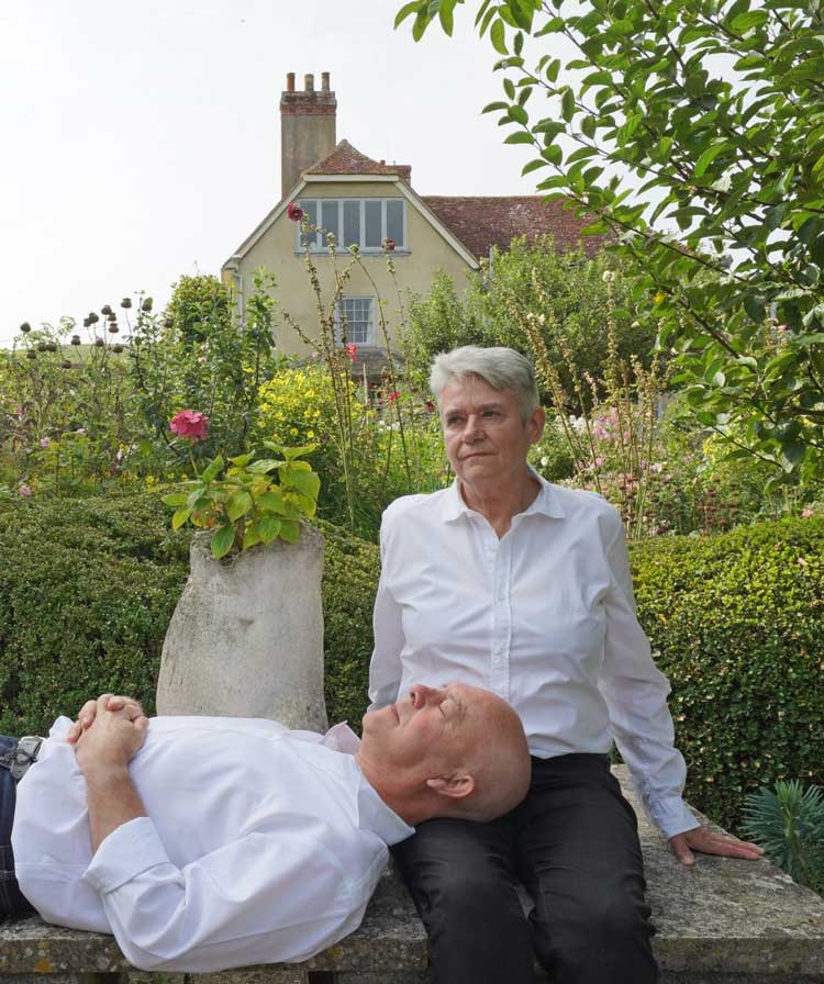 Langlands & Bell in the garden at Charleston below Vanesa Bell’s attic studio window.