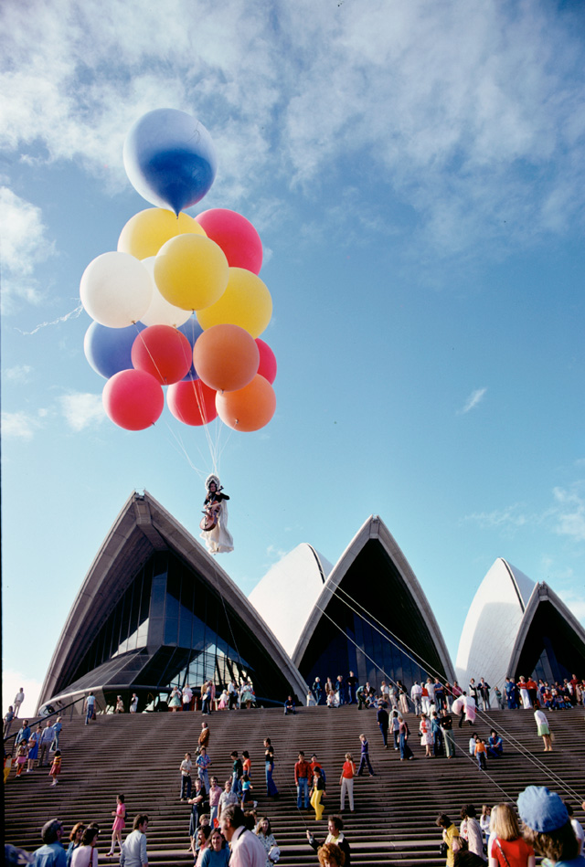 Kaldor Public Art Project 5: Charlotte Moorman and Nam June Paik. Charlotte Moorman performs Sky Kiss, composition by Jim McWillliams, above the Sydney Opera House Forecourt, 11 April 1976. Photo: Kerry Dundas.