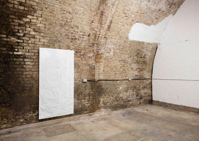 Piotr Lakomy. Untitled, 2016. Body bag, insulation foam, beeswax, 183 x 100 cm.