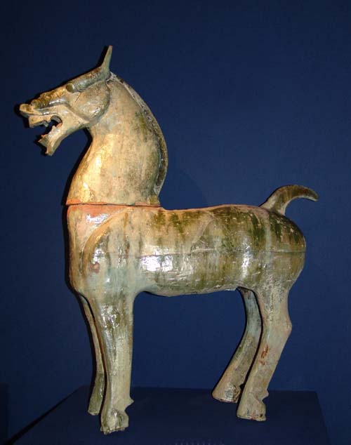 A large green glazed pottery figure of a horse. Han Dynasty (206 B.C.–220 A.D.) H. 33