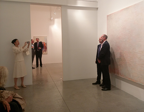 Christopher Le Brun being photographed by Mariko Mori in front of Neither White, nor Warm nor Cold, 2013. Photograph: Miguel Benavides