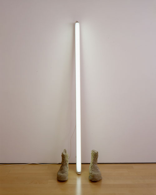 Sarah Lucas. Unknown Soldier, 2003. Concrete boots, neon tube, 183 x 58 x 36 cm. Copyright the artist, courtesy Sadie Coles HQ, London.