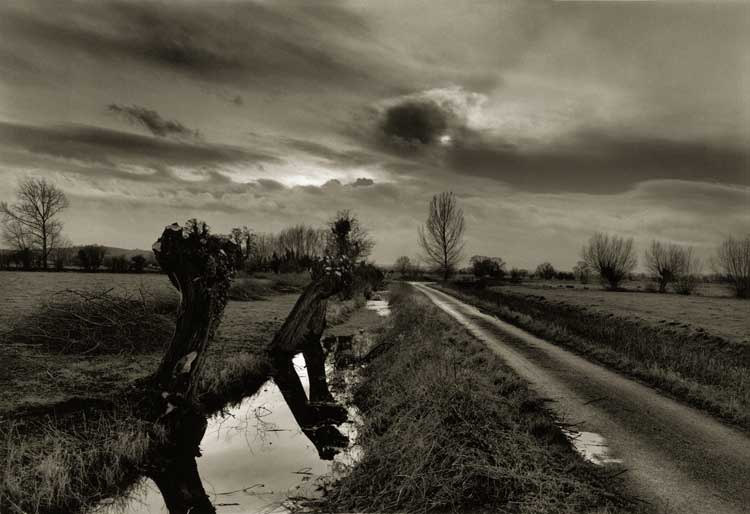Don McCullin, Somerset Levels near Glastonbury, 1990. © Don McCullin. Courtesy the artist and Hauser & Wirth.