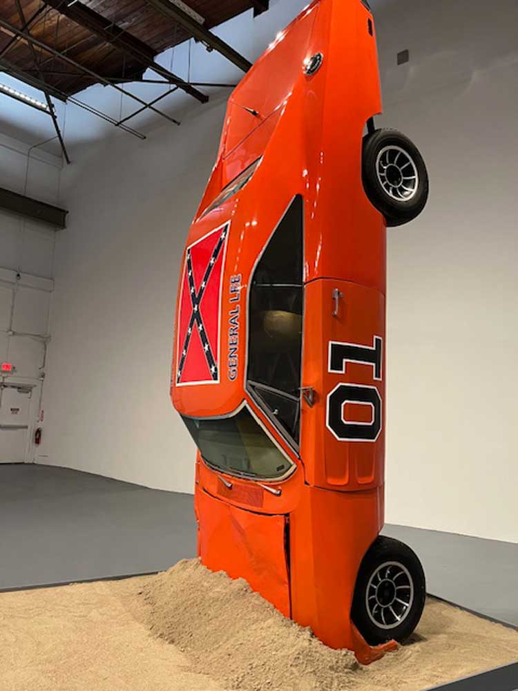 Hank Willis Thomas, Suspension of Hostilities, 2019. 1969 Dodge Charger. Installation view, Monuments, The Geffen Contemporary at MOCA. Courtesy of The Museum of Contemporary Art (MOCA) and The Brick. Photo: Jill Spalding.