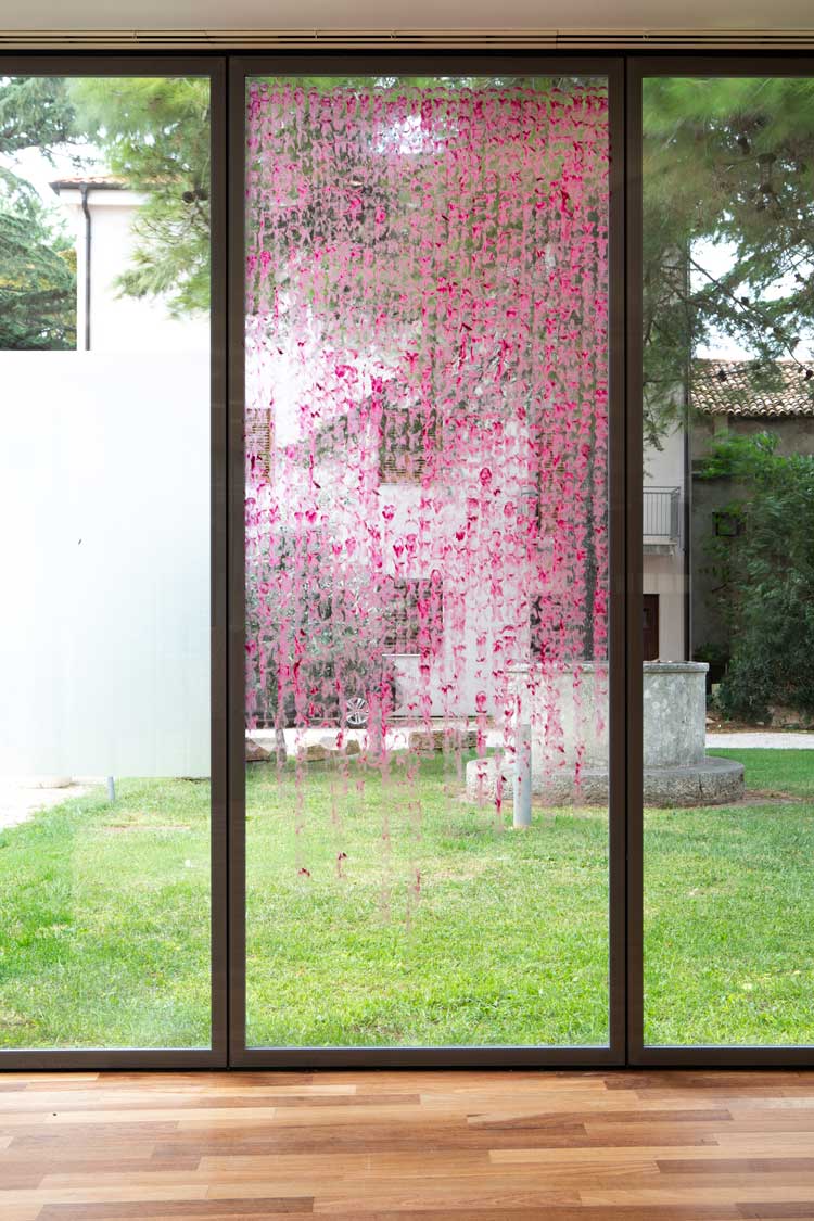 William Mackrell, Divine, 2024. Lipstick performance work. Gallery view, Muzej-Lapidarium Croatia.