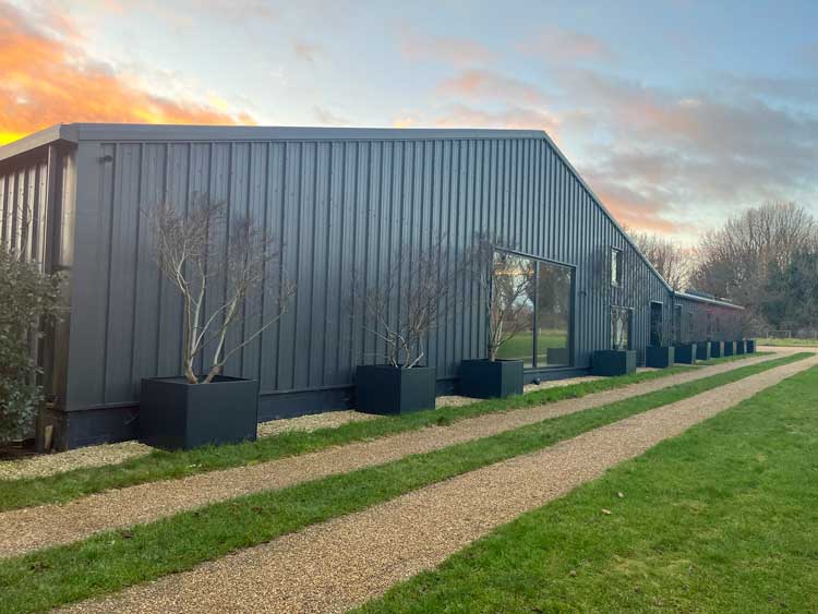 This former Alpaca shed now houses a spacious recording studio with views onto the landscape at the rear. Photo: Veronica Simpson.