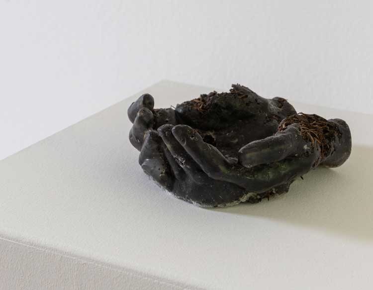 Yulia Mahr. Hands IV, 2023. Soap, earth, wood, soil-derived natural dyes. Unbecoming. Installation view, Unbecoming, Wehrmuehle, 2024. Photo: Angela Simi.