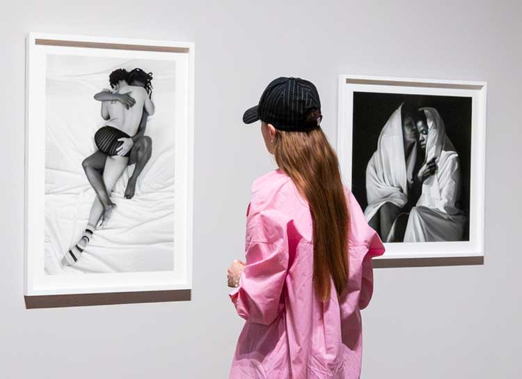 Right: ZaVa IV, Bordeaux, 2013, part of the Being series. Zanele Muholi installation view at Tate Modern, 2024. Photo (c) Tate (Larina Fernandes).