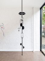 Marlena Kudlicka, Black Discrete 00, 2025. Powder coated steel, 90 3/5 × 11 4/5 × 11 4/5 in (230 × 30 × 30 cm). Installation view, Nguyen Wahed Gallery, New York, 2025. Photo courtesy Nguyen Wahed Gallery.