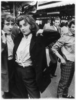 Roger Mayne. Teddy Girls, Battersea Funfair 1956. Vintage gelatin silver print, 58.3 x 43.8cm. Courtesy Victoria & Albert Museum.