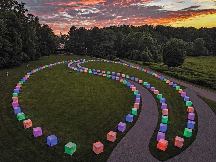 Bruce Munro, SOS Longwood Gardens, 2022. Gabion baskets, heavy duty sacks, speakers, sound track, 108 x 48 metres. Copyright © 2022 Bruce Munro. All rights reserved. Courtesy Longwood Gardens Carol Gross.