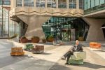 Sabine Marcelis, Swivel, 2022. Rotating stone chairs, installation view, Centre Point, St Giles Square, London. Photo: Ed Reeves.