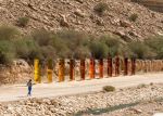 Sabine Marcelis, Light Horizon, installation view, Noor Riyadh 2022. 11 coloured, 2-way mirrored glass columns. Photo: Ruben P Bescos.