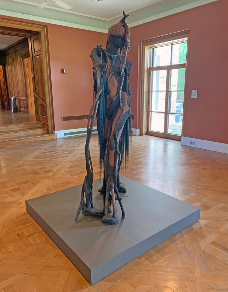 Wangechi Mutu, She Walks, 2019. Red soil, charcoal, paper pulp, wood, wood glue, steel nails and synthetic hair, 82 7/10 x 39 4/5 x 20 1/10 in. Photo: Yasmeen Siddiqui.