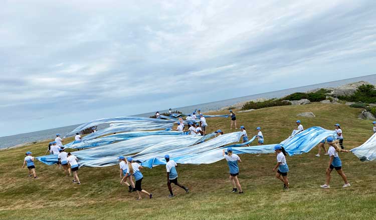 Melissa McGill. In the Waves, 2021. Performance at Rough Point, Newport, Rhode Island. Photo: Natasha Harrison.