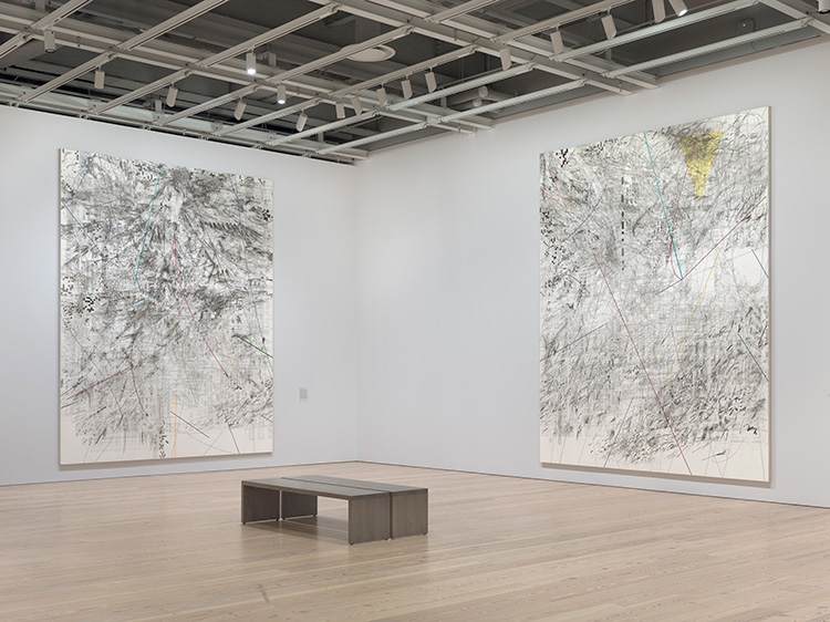 Installation view of Julie Mehretu (Whitney Museum of American Art, New York, March 24-August 8, 2021). From left to right: Mogamma (A Painting in Four Parts) Part 2, 2012; Mogamma (A Painting in Four Parts) Part 3, 2012. Photo: Ron Amstutz.