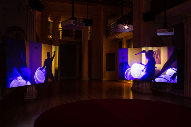 Angelica Mesiti, ASSEMBLY, 2019. Installation view, Angelica Mesiti: In the Round, Talbot Rice Gallery, University of Edinburgh, 2021. Photo: Sally Jubb.