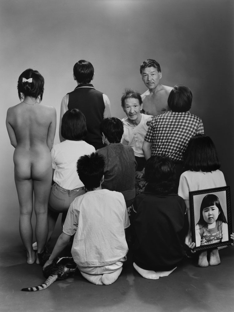 Masahisa Fukase. Upper row, from left to right: A, a model; 
Toshiteru, Sukezo, Masahisa. Middle row, from left to right: Akiko, Mitsue, Hisashi Daikoji. Bottom row, from left to right: Gaku, Kyoko, Kanako, and a memorial portrait of Miyako, 1985, from the series Family, 1971-90. © Masahisa Fukase Archives.