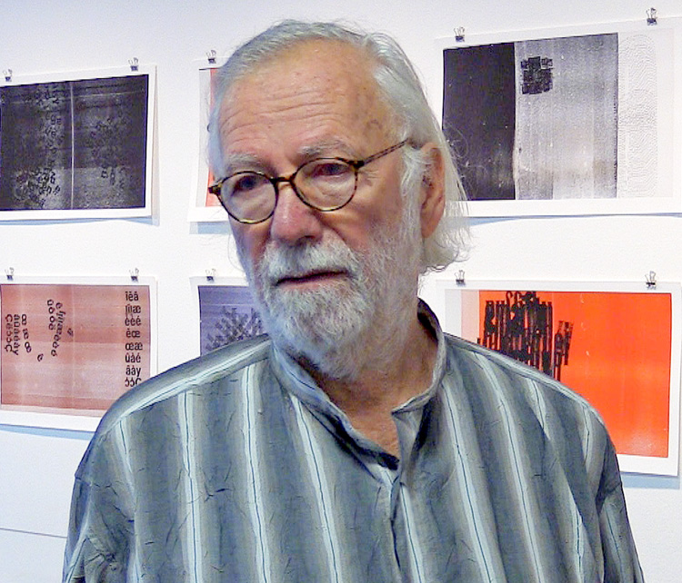 Hansjörg Mayer speaking to Studio International at the opening of Hansjörg Mayer: Typoems and Artists’ Books at the Kunstbibliothek, Berlin, 25 October 2019. Photo: Martin Kennedy.