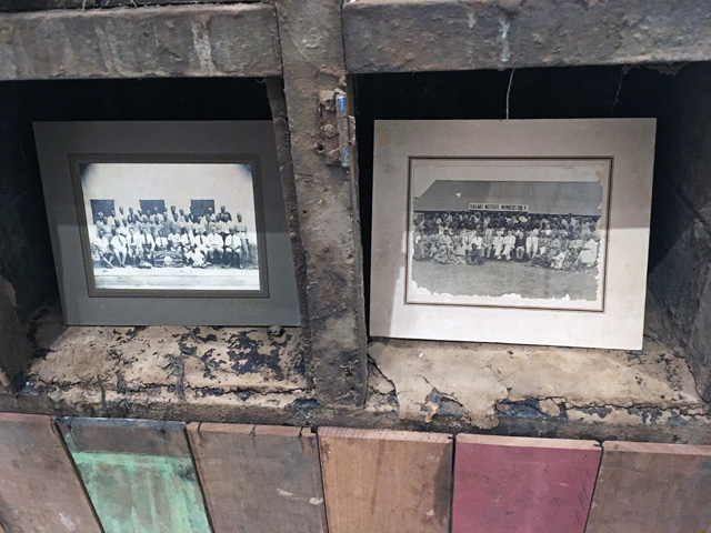 Ibrahim Mahama, The Archive, detail of locker structure with old office and bureaucratic photos. Installation view, Whitworth Art Gallery, Manchester, 2019. Photo: Veronica Simpson.