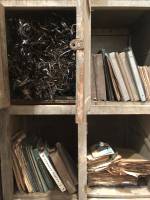 Ibrahim Mahama, The Archive, detail of locker structure with unspooled tapes. Installation view, Whitworth Art Gallery, Manchester, 2019. Photo: Veronica Simpson.