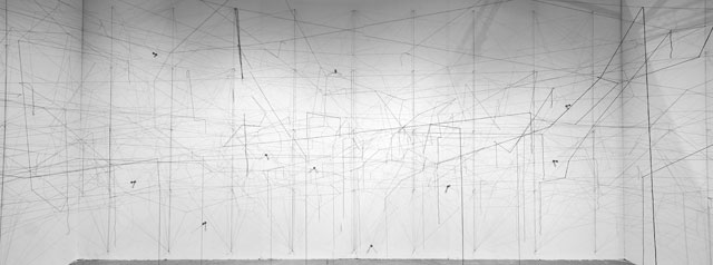 Gustavo Pérez Monzón. SOSTENIDO, 2017. Site specific installation of elastic thread and lead, dimensions variable. Photo: Issac Martínez. © The Artist; Courtesy Richard Saltoun Gallery, London.