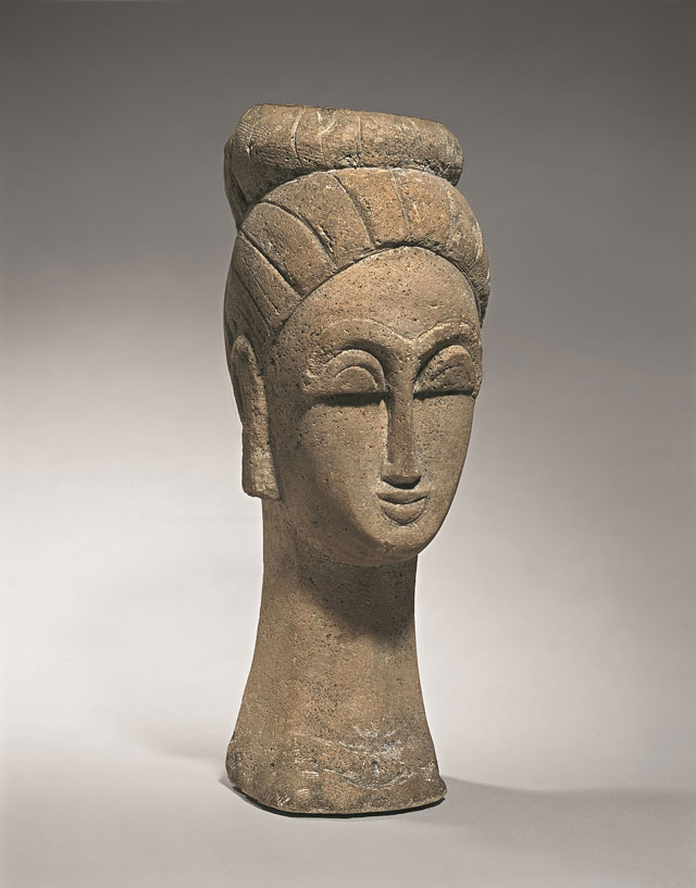 Amedeo Modigliani. Woman's Head (With Chignon), 1911-12. Sandstone, 57.2 x 21.9 x 23.5 cm. Merzbacher Kunststiftung.