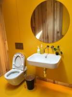 Toilets are bright and cheerful. Maggie’s Centre for cancer care, Oldham. Photograph: Veronica Simpson.
