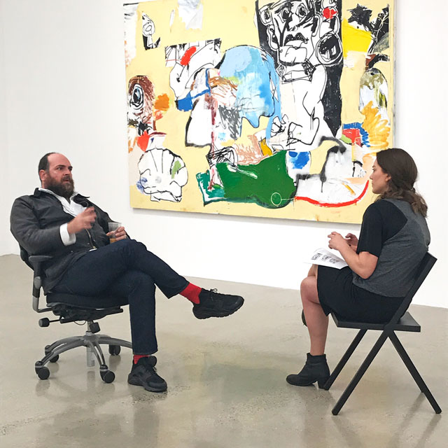 Eddie Martinez talking to Studio International at the opening of Cowboy Town at Timothy Taylor Gallery, London, April 2017. Photograph: Martin Kennedy.