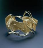 Mary Lee Hu. <em>Bracelet #62</em>, 2002. 18k and 22k gold. Overall: 2 7/8 x 3 5/8 x 2 11/16in. (7.3 x 9.2 x 6.8cm). Museum of Arts & Design, New York. Museum purchase with funds provided by Ann Kaplan, 2002. Photo credit: Richard Goodbody.