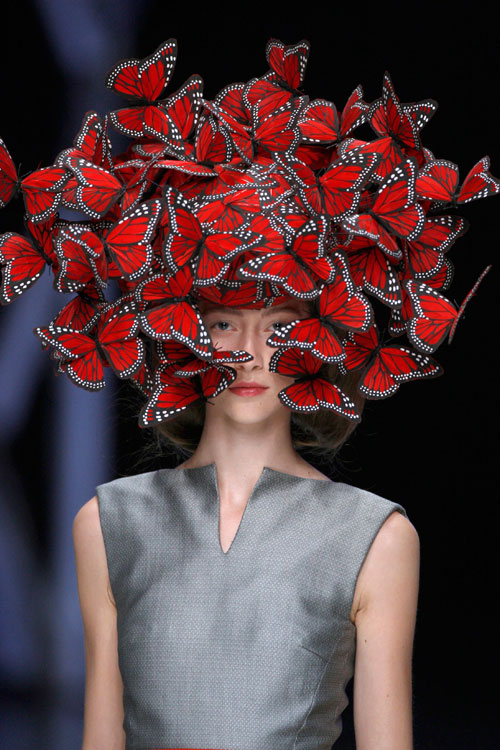 Butterfly headdress of hand-painted turkey feathers. Philip Treacy for Alexander McQueen. La Dame Bleue, S/S 2008. Model: Alana Zimmer © Anthea Simms.