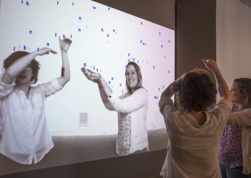 Camille Utterback and Romy Achituv. Text Rain, 1999. Single channel interactive projection, Museum purchase made possible by the American Art Forum Smithsonian American Art Museum. © 1999 Camille Utterback and Romy Achituv.