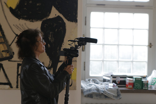 Susan Steinberg filming at Rose Wylie's exhibition at Städtische Galerie, Wolfsburg. Photographer: Sojo Yang.