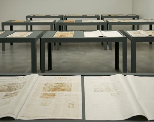 Oscar Muñoz. <em>Paístiempo</em>, 2007. Burnt newsprint, 33 x 56 cm. Installed at Rivington Place. Photograph © Thierry Bal, 2008