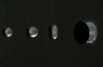Oscar Muñoz. <em>Eclipse</em>, 2000. Seven concave mirrors, 20 cm each. Installed at Rivington Place. Photograph © Thierry Bal, 2008