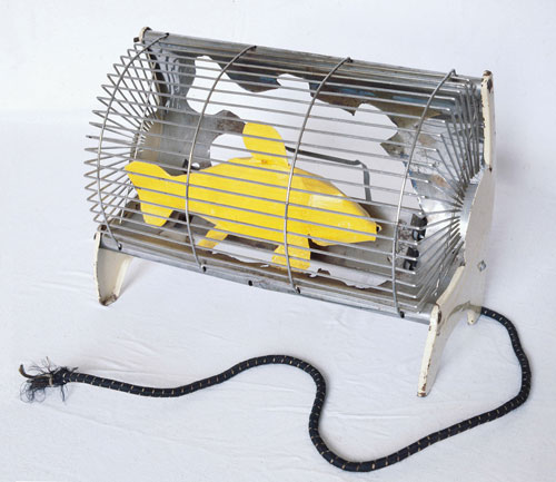 Bill Woodrow. <em>Electric Fire with Yellow Fish</em>, 1981. Electric fire, enamel and acrylic paint, 27 x 37 x 19 cm. Waddington Galleries, London. Photo courtesy Waddington Galleries, London. Copyright Bill Woodrow.