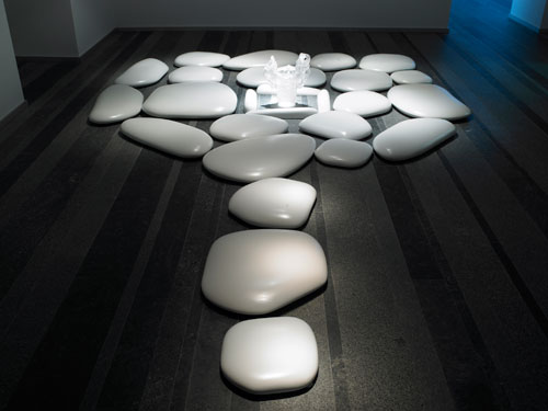 Mariko Mori. Flatstone, 2006. Ceramic stones and acrylic vase, 192 x 124 x 3 ½ inches. Courtesy of SCAI THE BATHHOUSE, Tokyo and Sean Kelly, New York.