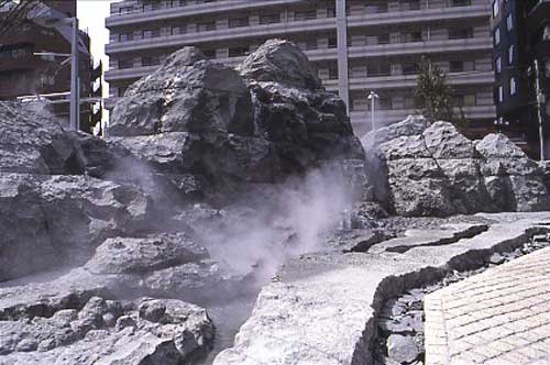 High mountain flowing water, by Cai Guo-Qiang, commissioned by 
              the Mori to be installed outside the museum
