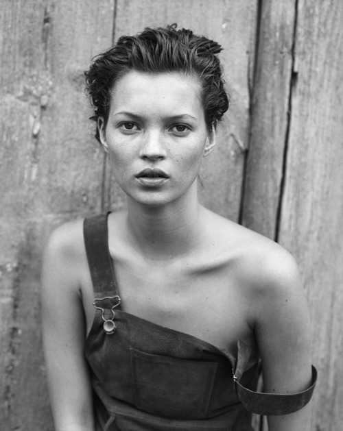 Kate Moss in overall dress, 1994, by Anna Molinari Blumarine (Italian, founded 1977).  Harper’s Bazaar, December 1994. Photograph by Peter Lindbergh (German, born 1944). Photograph courtesy of Peter Lindbergh.