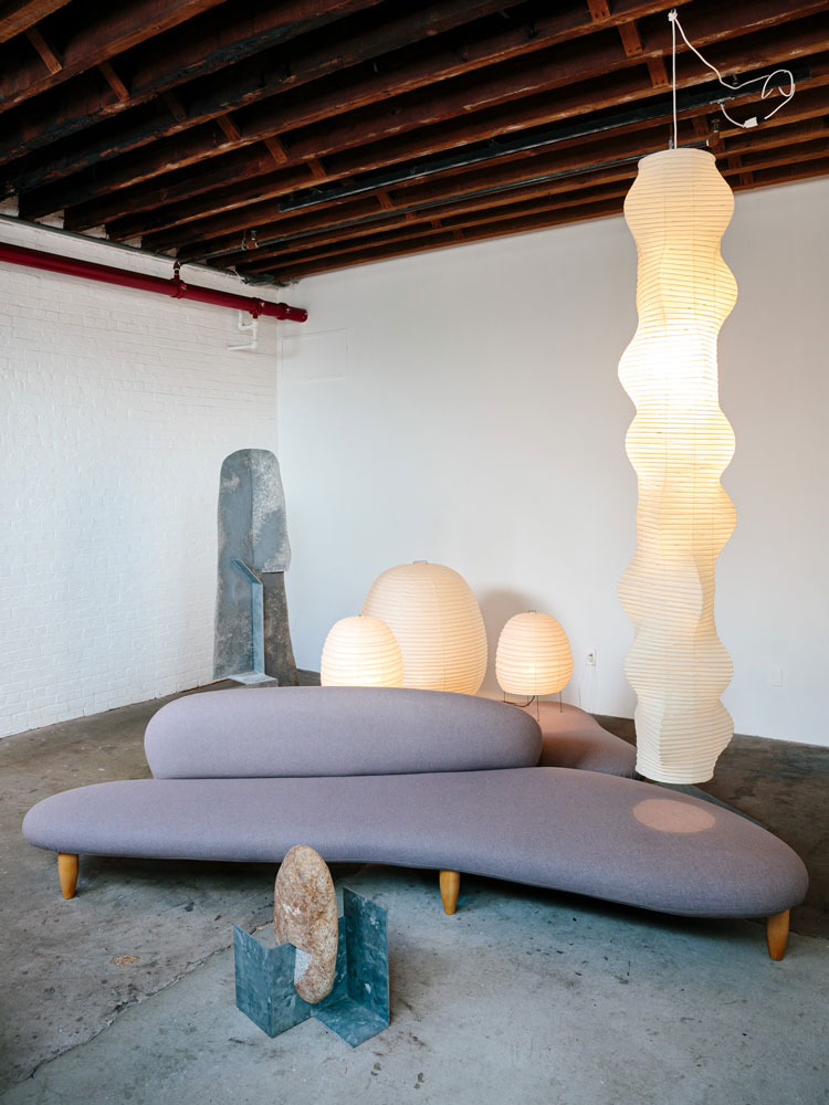 Objects of Common Interest 'Lounge' with Inflatable Lights, 2021, Tube Light Columns, 2019, Metamorphic Rocks, 2021, Tube Chair, 2018, and Rock Side Tables, 2021. Photo: Brian W. Ferry. ©INFGM / ARS.
