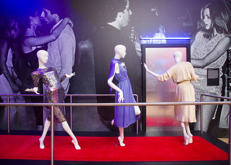 Night Fever: Designing Club Culture, mannequins wearing Halston dresses, 1970s, installation view, V&A Dundee. Photo: Michael McGurk.