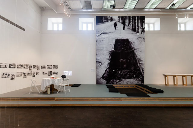 On Liteinyi, performance by Igor Panin 29 June 1996 and Movement of Tea Table toward Sunset, a Seven-Day Journey, performance 25 August 1996 by Igor Panin, Sergei Spirikhin, Vadim Fliagin, Alexander Liashko. Installation view at MMoMA © Mikhail Grigoriev.