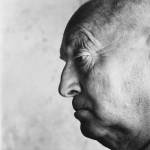 Close-up profile head shot of writer-lepidopterist Vladimir Nabokov.