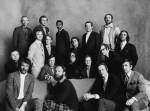 Regulars at the restaurant, Elaine's, in Manhattan, including, front row left to right: Arthur Kopit, Jack Gelber, George Plimpton and Gay Talese; second row, seated: Willie Morris, Jack Richardson, Elaine Kaufman, Christopher Cerf, David Halberstram; third row: Nicholas Pileggi, Robert Brown, Jean-Pierre Rassam (centre), and Bernard Farber (far right); back row: John Barry Ryan, III, Lewis H. Lapham, Bobby Short, William Styron, and Bruce Jay Friedman