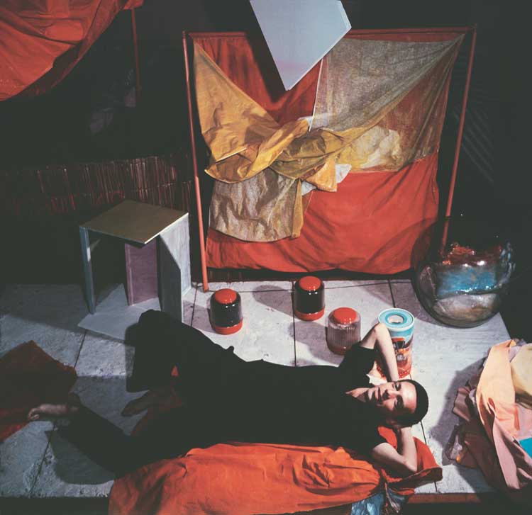 Hélio Oiticica with Bólides and Parangolés at his atelier at Engenheiro Alfredo Duarte Street, Rio de Janeiro, 1965. Photo: Claudio Oiticica. Courtesy of César and Claudio Oiticica.