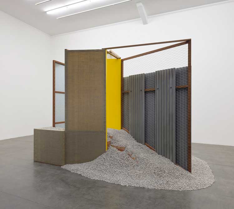 Hélio Oiticica. PN 28 Penetrable, Nas Quebradas, 1979. Wood, brick, metal, nylon mesh, metal mesh, roof tile, plastic and jute, 357 x 450 x 310 cm (140 1/2 x 177 1/8 x 122 in). © Estate of Hélio Oiticica, Courtesy Lisson Gallery.