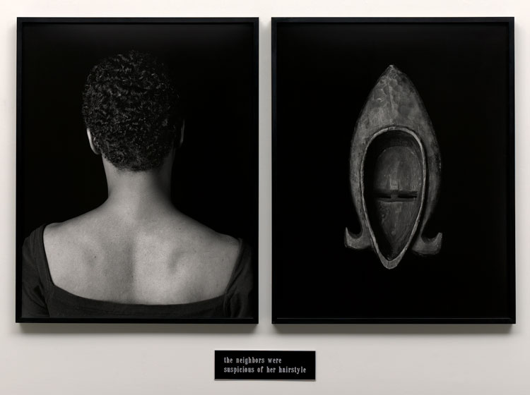 Lorna Simpson. Flipside, 1991. Gelatin silver prints and engraved plastic plaque, diptych, edition 2/3, 51 1/2 x 70 in (130.8 x 177.8 cm) overall. Solomon R. Guggenheim Museum, New York.