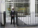 Harold Offeh. Services Rendered Doorman, Performance at David Roberts Art Foundation, 2009.